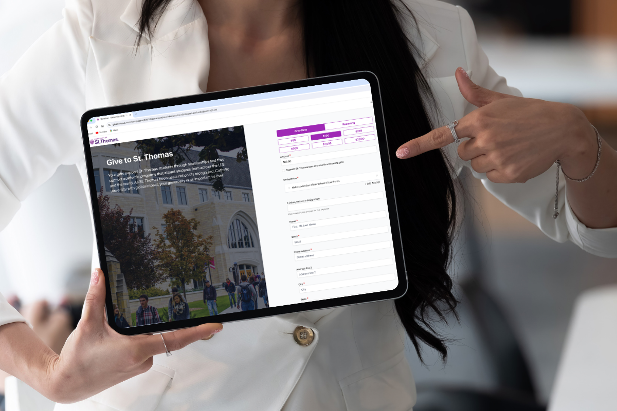 Person making an online gift on their tablet